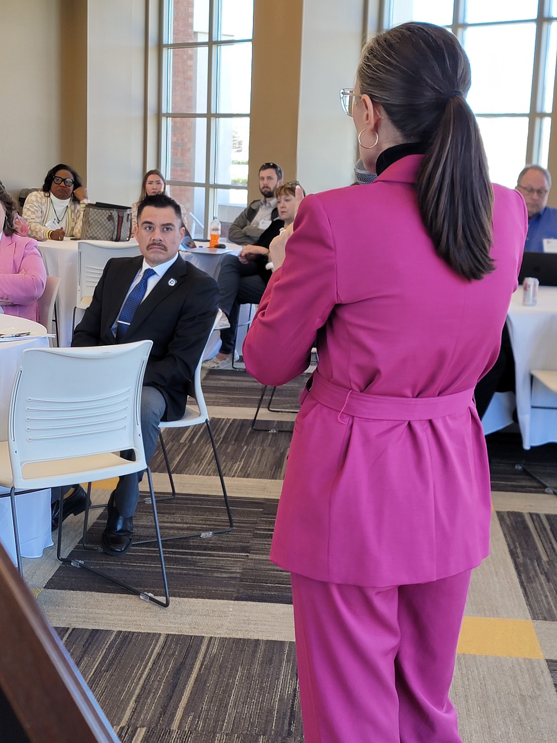 Moriah Kent speaking to an audience